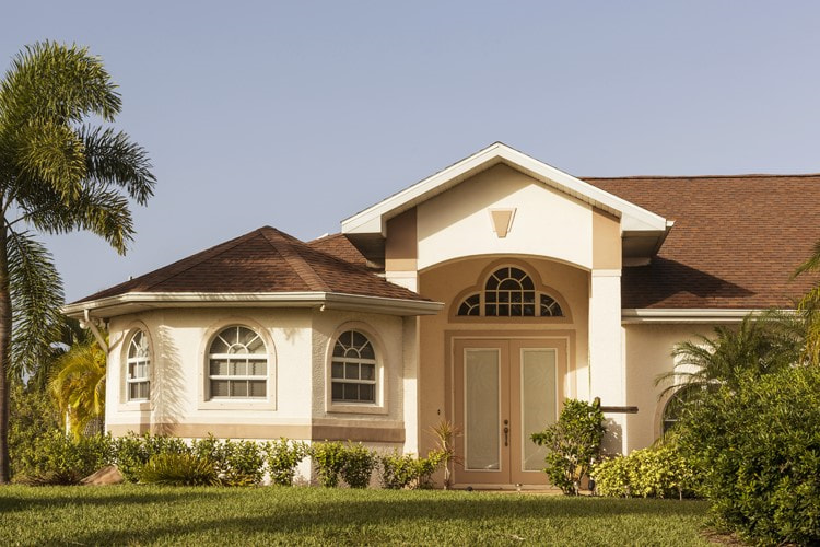 white-house-brown-roof